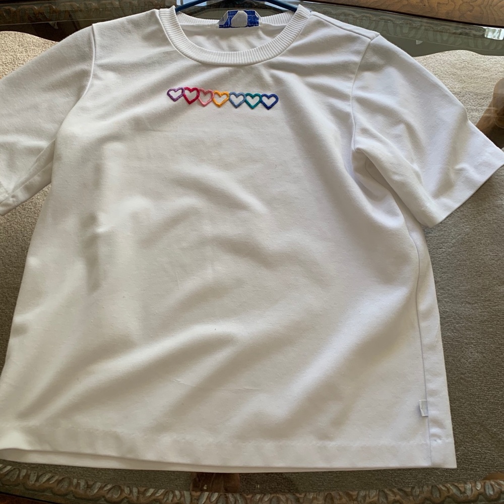 White nurse mate uniform top.